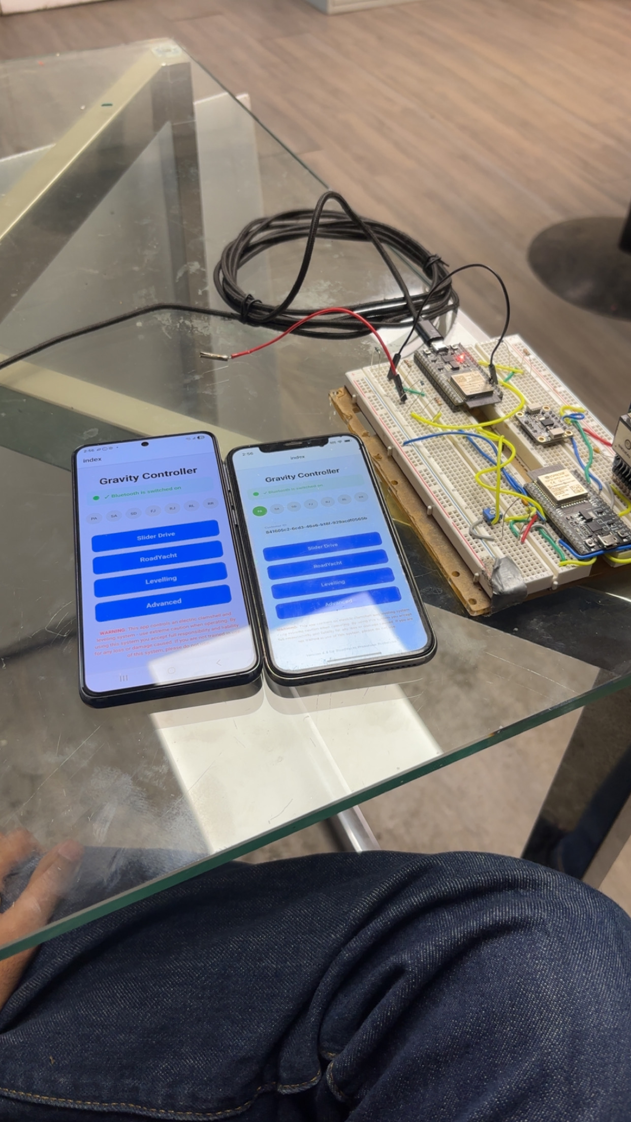 Oscilloscope probe on motor controller PCB during bench testing